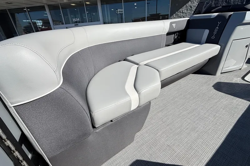 Slide: The Image of Luxurious seating on 2026 Viaggio X24U boat, featuring sleek gray and white upholstery. - 26