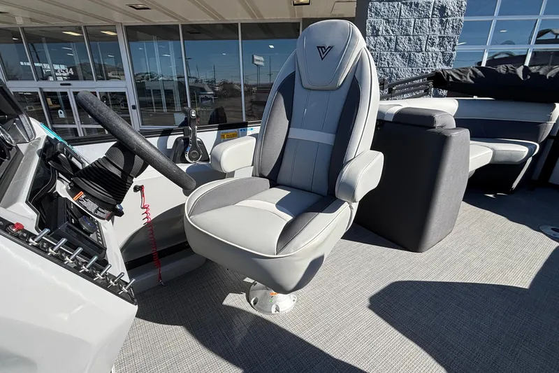 Slide: The Image of Captain's chair in 2026 Viaggio X24U boat, featuring modern design and controls. - 8