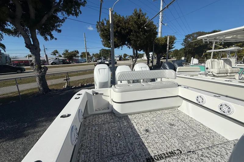 Slide: The Image of 2016 Contender 35 ST boat interior with seating and deck details. - 16