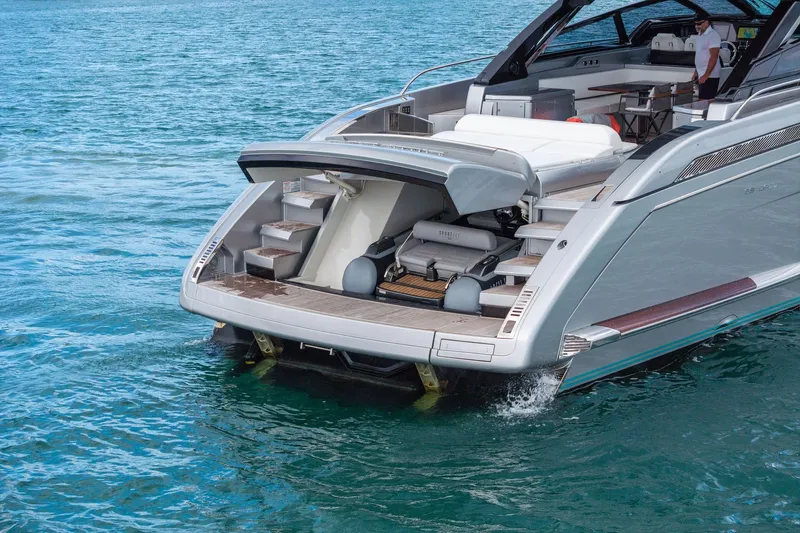 Slide: The Image of Luxury Riva 68 Diable yacht, 2023 model, with open deck and water access. - 11