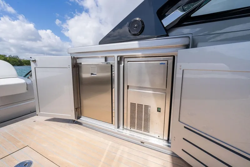 Slide: The Image of Outdoor kitchen on 2023 Riva 68 Diable yacht with stainless steel appliances. - 26
