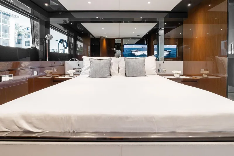 Slide: The Image of Luxurious bedroom interior of 2023 Riva 68 Diable yacht with modern design elements. - 45
