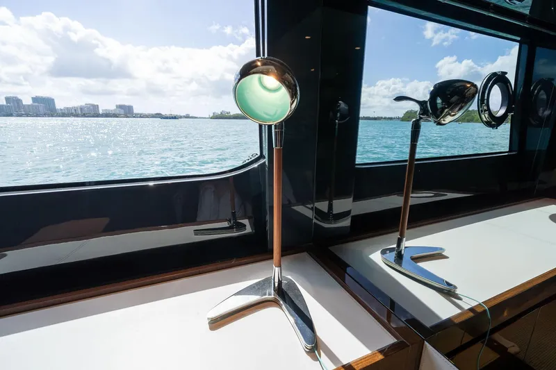 Slide: The Image of Interior view of 2023 Riva 68 Diable yacht with ocean backdrop. - 47