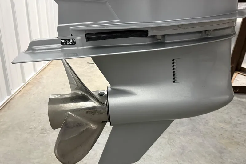 Slide: The Image of Close-up of a 2023 Axopar 25 Cross Bow boat propeller and lower unit. - 24