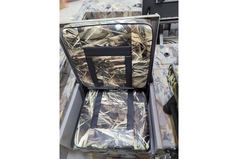 Slide: The Image of Camo-patterned seat in 2025 Ranger RB210 boat, showcasing rugged outdoor design. - 15