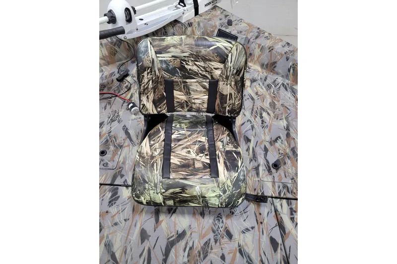 Slide: The Image of Camouflage seat on 2025 Ranger RB210 boat with matching pattern. - 26
