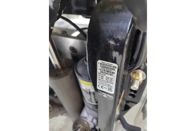 Slide: The Image of Close-up of a 2025 Ranger RB210 engine component with model number label. - 30