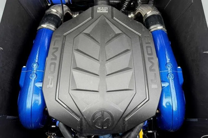 Slide: The Image of 2026 MasterCraft XT23 Ilmor engine with blue accents, top view. - 11