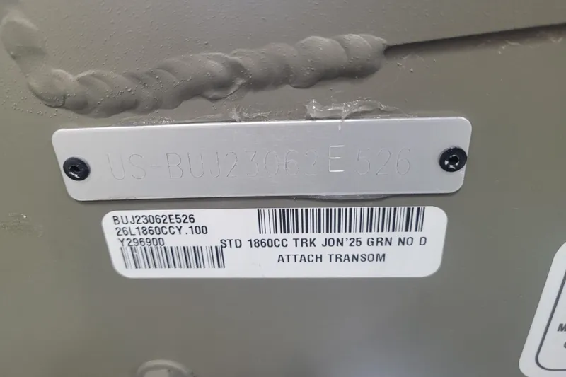 Slide: The Image of 2026 Tracker Grizzly 1860 CC boat identification plate with serial numbers and barcode. - 15