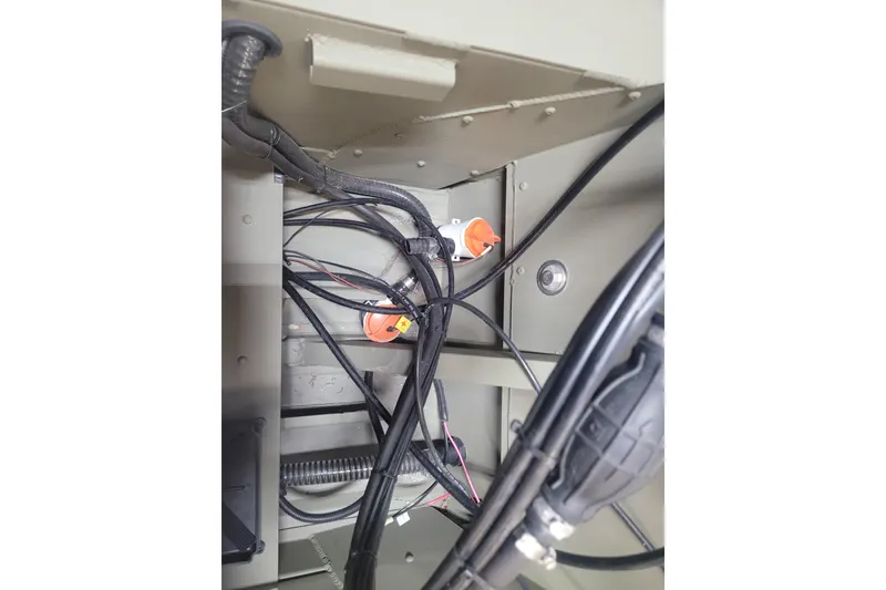 Slide: The Image of Interior wiring of 2026 Tracker Grizzly 1860 CC boat, showcasing cables and connectors. - 5