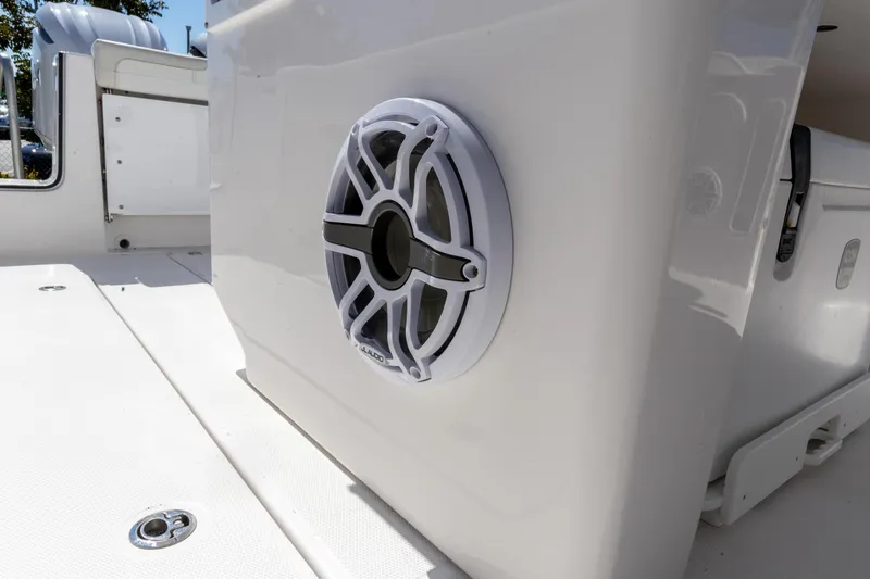 Slide: The Image of 2026 Edgewater 285CC boat interior with JL Audio speaker detail. - 23