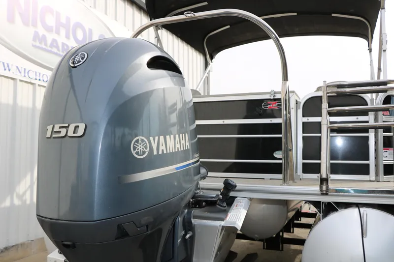 Slide: The Image of 2021 Trifecta 22 RFC pontoon boat with Yamaha 150 outboard motor. - 11