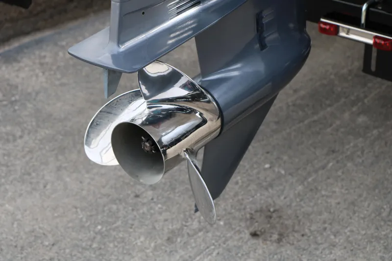 Slide: The Image of Propeller of 2021 Trifecta 22 RFC boat on concrete surface. - 12