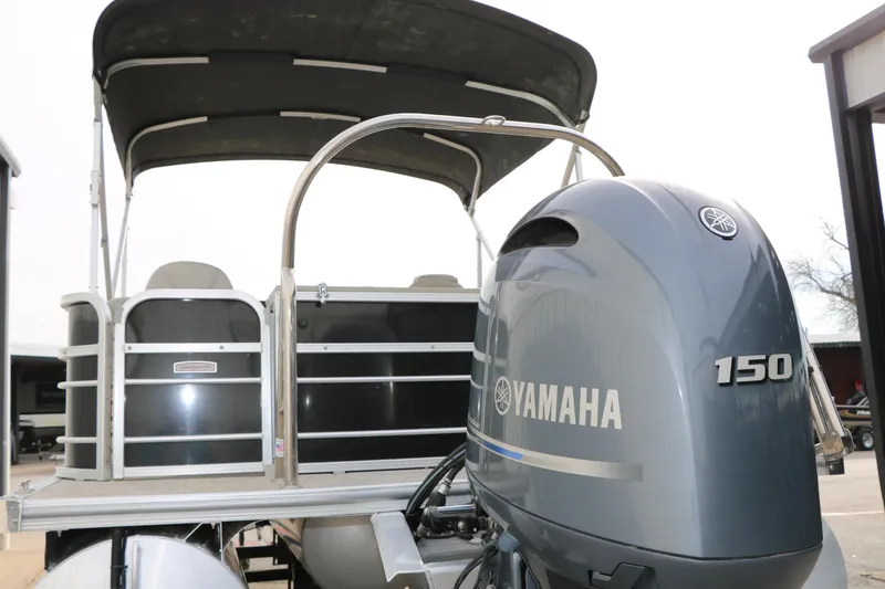 Slide: The Image of 2021 Trifecta 22 RFC pontoon boat with Yamaha 150 outboard motor. - 13