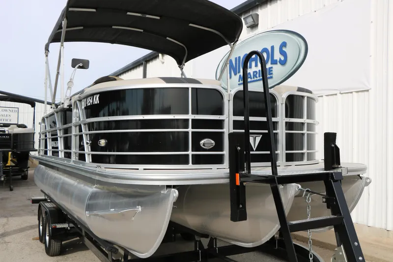 Slide: The Image of 2021 Trifecta 22 RFC pontoon boat at Nichols Marine dealership. - 4