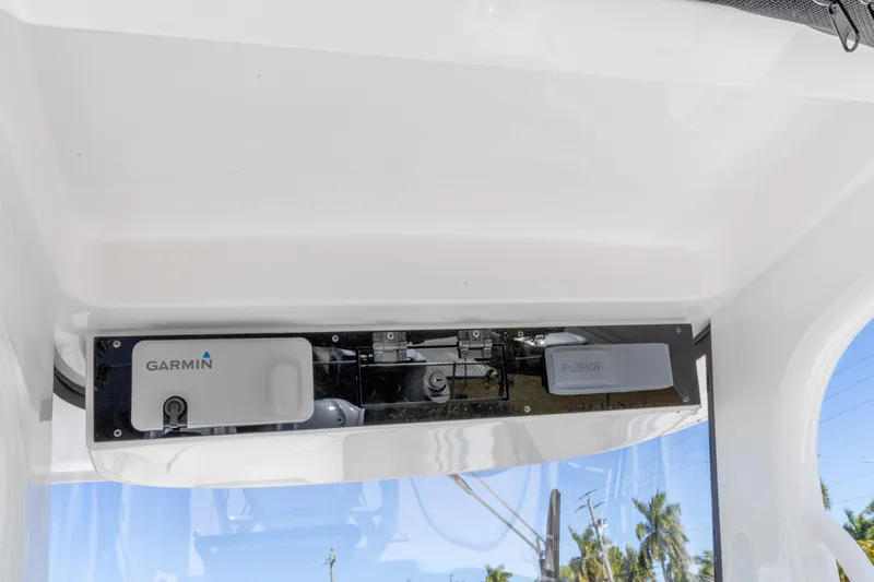 Slide: The Image of 2026 Edgewater 262CC boat console featuring Garmin and Fusion electronics. - 20