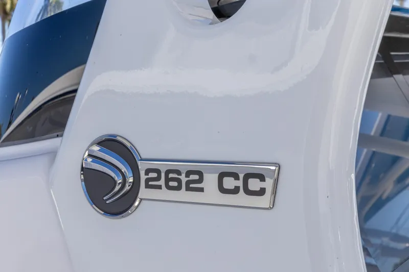 Slide: The Image of Edgewater 262CC boat emblem, 2026 model, displayed on sleek white surface. - 21