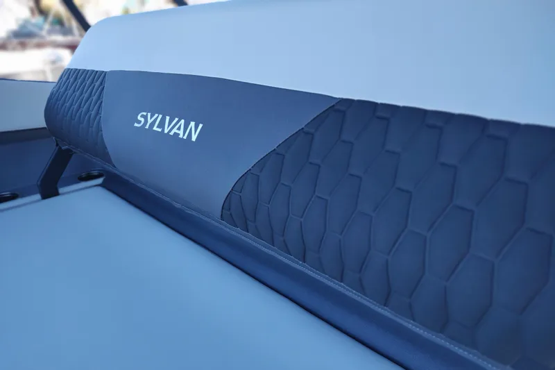Slide: The Image of 2026 Sylvan R-22 boat seat with textured design and logo. - 15