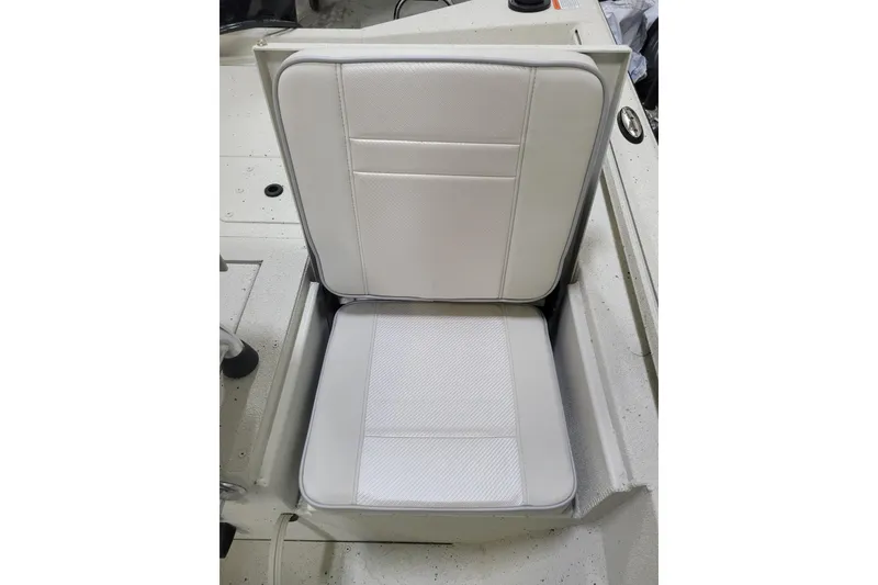 Slide: The Image of White cushioned seat on 2025 Ranger RB210 boat, showcasing sleek design and comfort. - 10