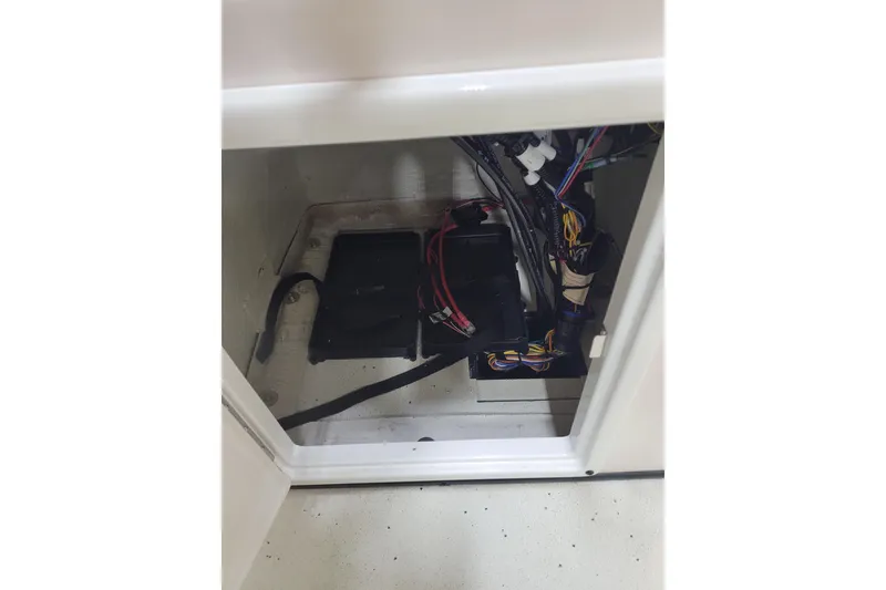 Slide: The Image of Interior view of 2025 Ranger RB210 boat wiring and components. - 14