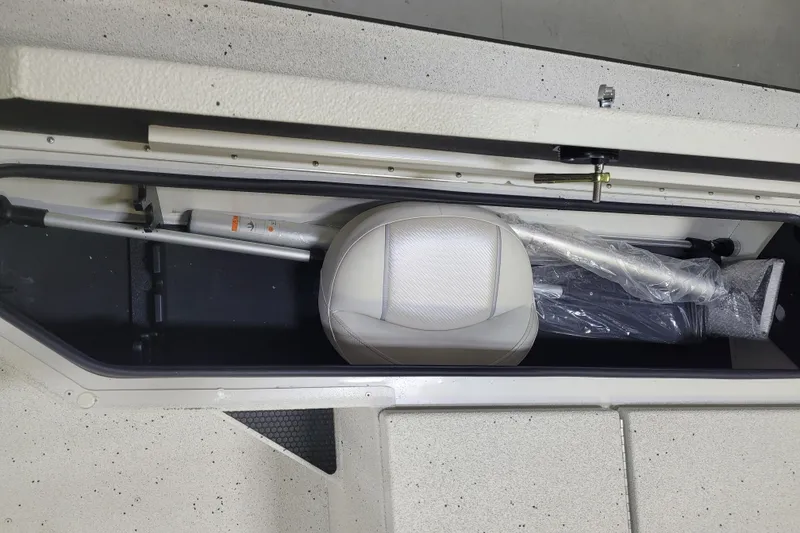 Slide: The Image of Storage compartment in 2025 Ranger RB210 boat with seat and equipment. - 18