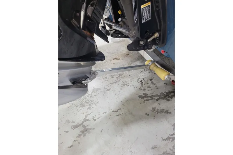 Slide: The Image of 2025 Ranger RB210 boat motor and trailer connection detail. - 3