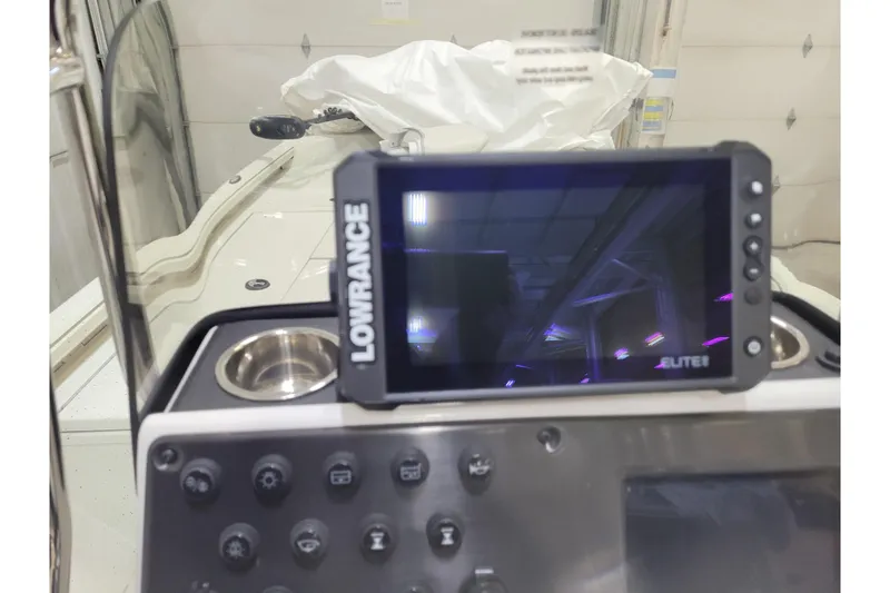 Slide: The Image of Lowrance Elite fishfinder on 2025 Ranger RB210 boat dashboard. - 8