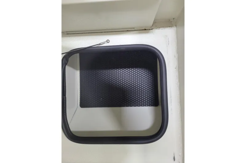 Slide: The Image of Ranger RB210 2025 boat step with non-slip surface, black frame, and cable attachment. - 9