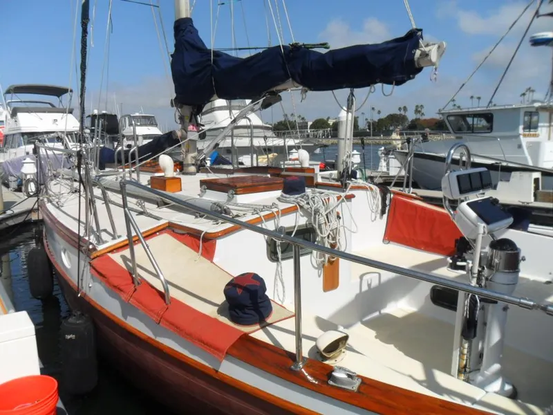 Slide: The Image of 1976 Ericson 36C sailboat docked at marina. - 12