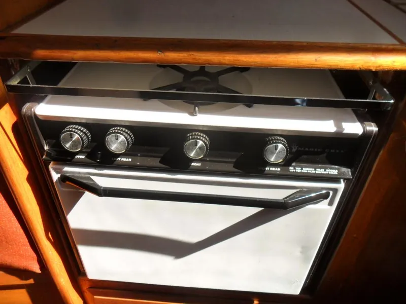 Slide: The Image of Kitchen stove in a 1976 Ericson 36C yacht. - 23