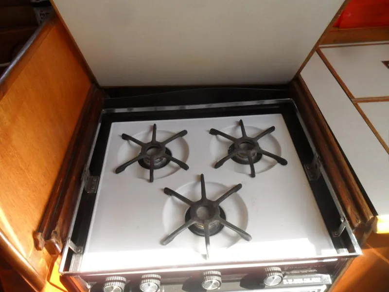 Slide: The Image of Three-burner stove on a 1976 Ericson 36C yacht. - 24
