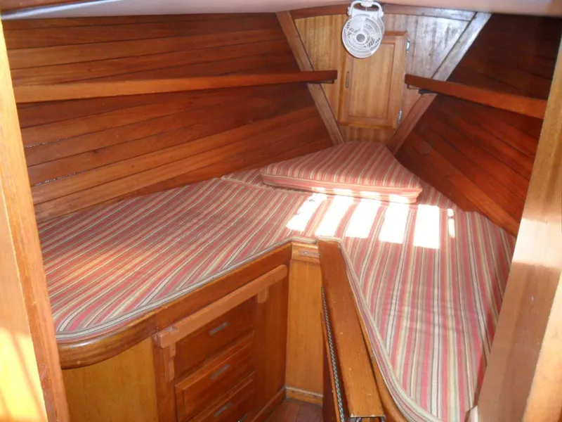 Slide: The Image of Interior of a 1976 Ericson 36C yacht with wooden paneling. - 27