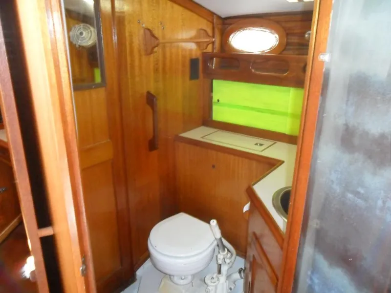 Slide: The Image of Interior of a 1976 Ericson 36C yacht with wooden fittings. - 31
