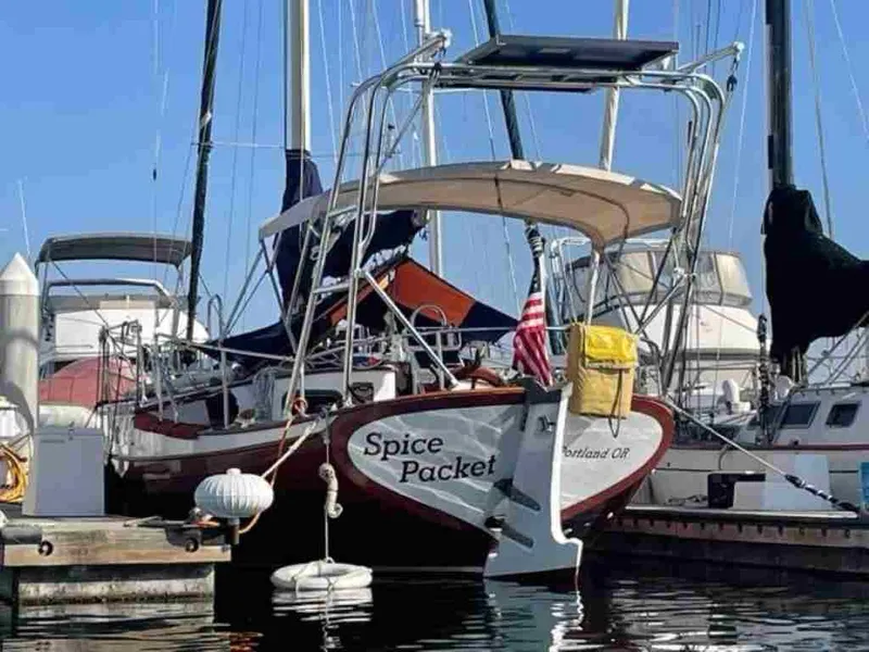 Slide: The Image of 1976 Ericson 36C sailboat docked in marina. - 6