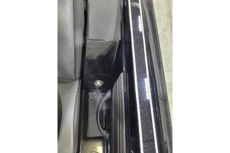 Slide: The Image of Interior detail of 2025 Triton 21XP, showcasing sleek design and materials. - 24