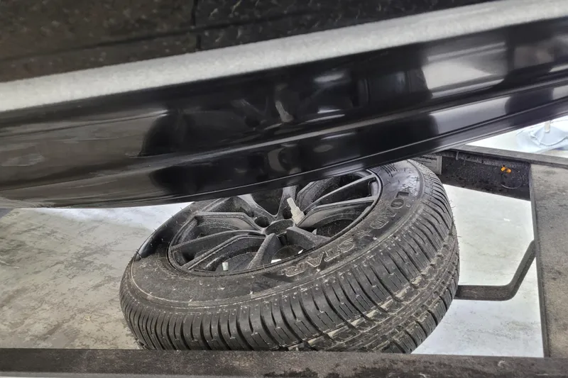 Slide: The Image of 2025 Triton 21XP tire and wheel detail on a trailer. - 3