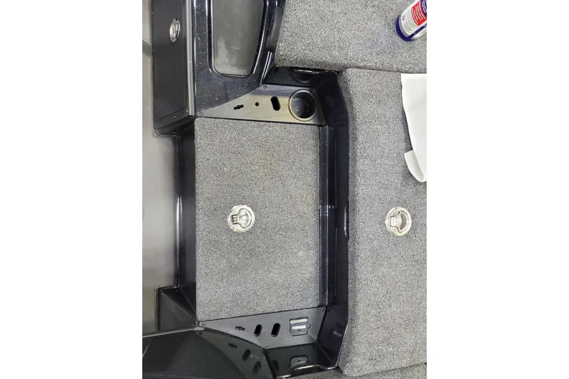 Slide: The Image of Interior view of 2025 Triton 21XP boat with carpeted flooring and storage compartments. - 30
