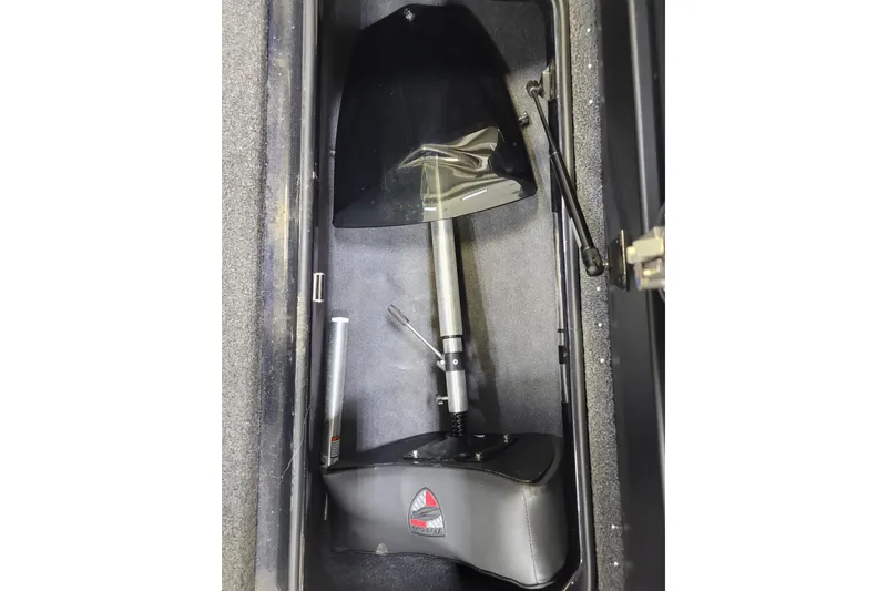 Slide: The Image of 2025 Triton 21XP boat compartment with hydraulic lift and storage space. - 4