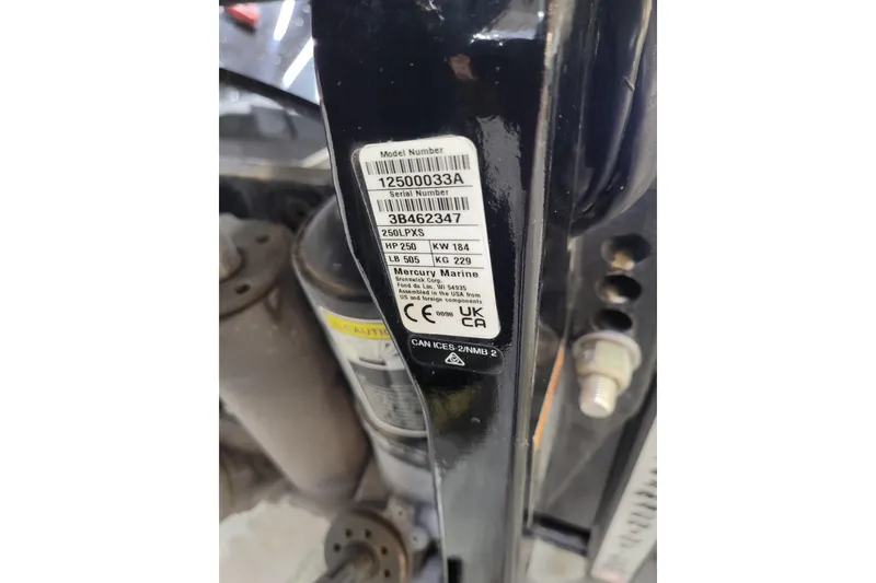 Slide: The Image of Label on Triton 21XP 2025 model, displaying specifications and serial number. - 44