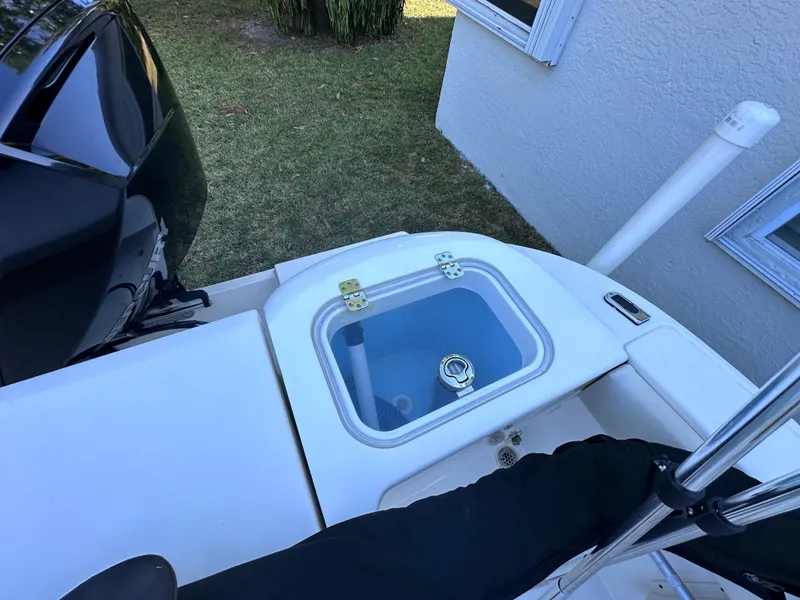 Slide: The Image of Cobia 220 Dual Console 2022 with motor and livewell. - 13