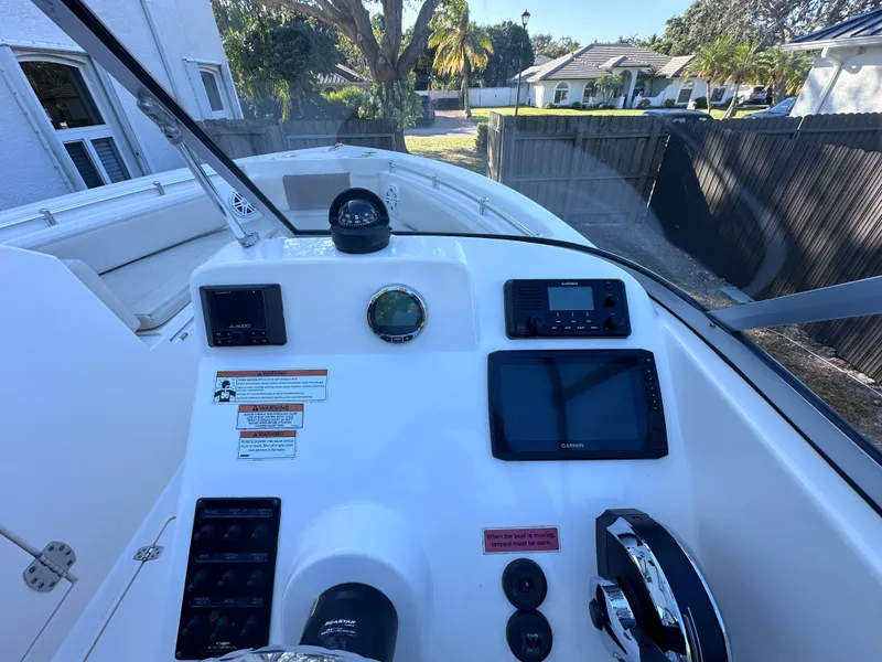 Slide: The Image of Interior view of 2022 Cobia 220 Dual Console boat. - 17
