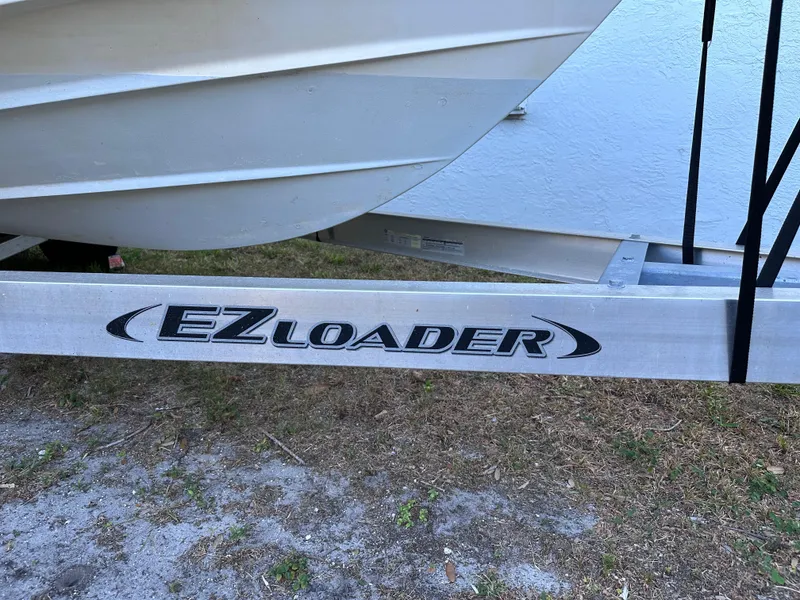 Slide: The Image of Cobia 220 Dual Console 2022 on EZ Loader trailer. - 3