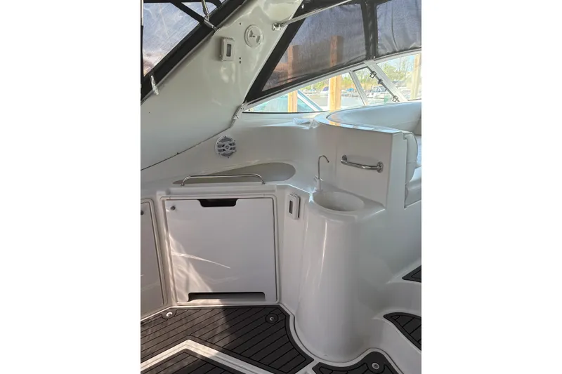 Slide: The Image of Interior of 2000 Cruisers 3870 yacht with sink and storage compartments. - 19