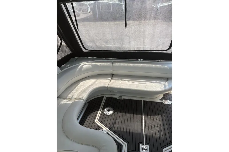 Slide: The Image of Luxurious seating area on a 2000 Cruisers 3870 yacht with sleek interior design. - 21
