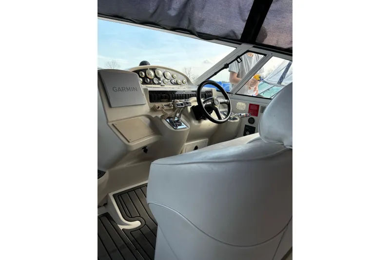 Slide: The Image of Interior helm of 2000 Cruisers 3870 yacht with Garmin navigation system. - 11