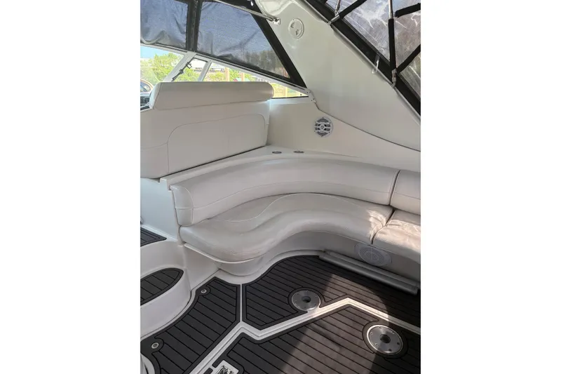 Slide: The Image of Interior of 2000 Cruisers 3870 yacht with white leather seating and sleek flooring. - 22