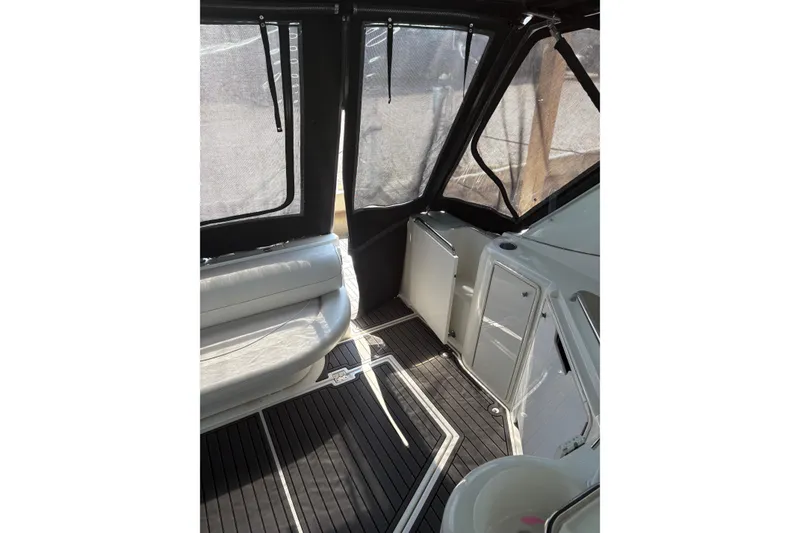Slide: The Image of Interior of 2000 Cruisers 3870 yacht with seating and storage compartments. - 24