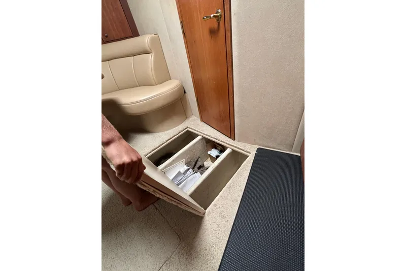 Slide: The Image of Interior of 2000 Cruisers 3870 yacht showing floor storage compartment. - 36
