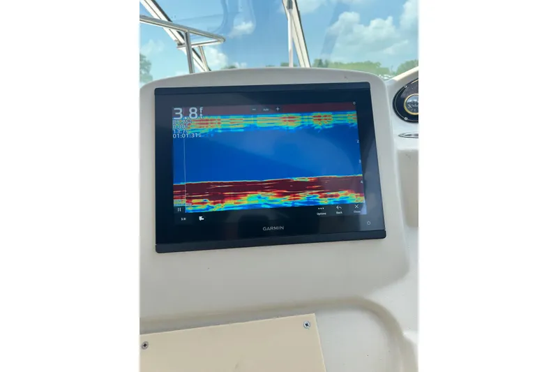 Slide: The Image of Garmin sonar display on 2000 Cruisers 3870 showing water depth. - 5