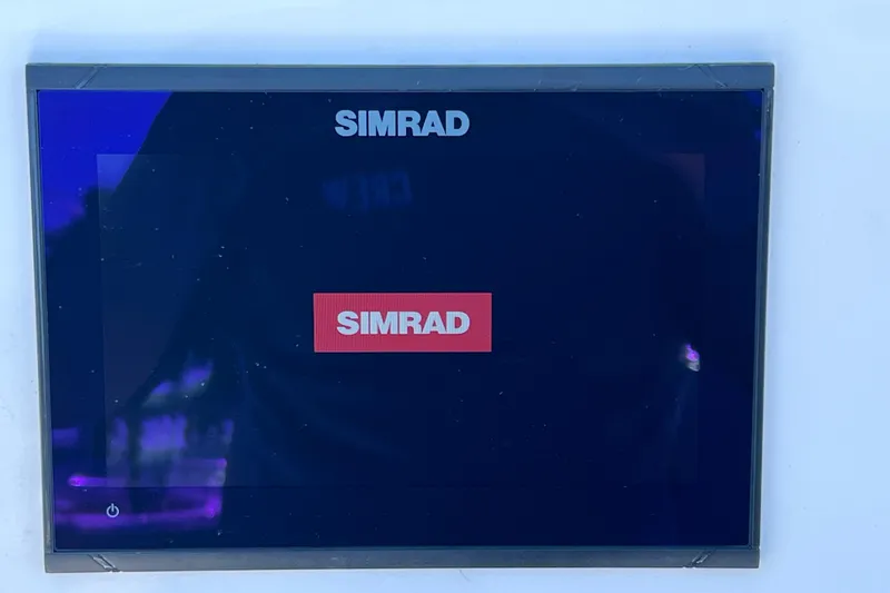 Slide: The Image of Simrad display screen on 2023 Sea Pro 248 Bay boat. - 25